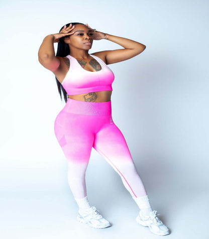 Cotton Candy Luxe Set showcased by a woman posing in a pink ombre, highlighting premium comfort loungewear.