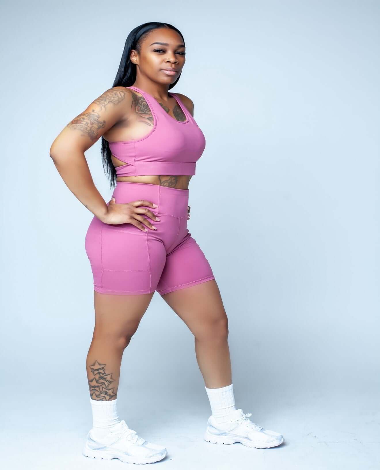 Model showcasing the Serenity Sculpt Set in a pink seamless shapewear and body contouring outfit.